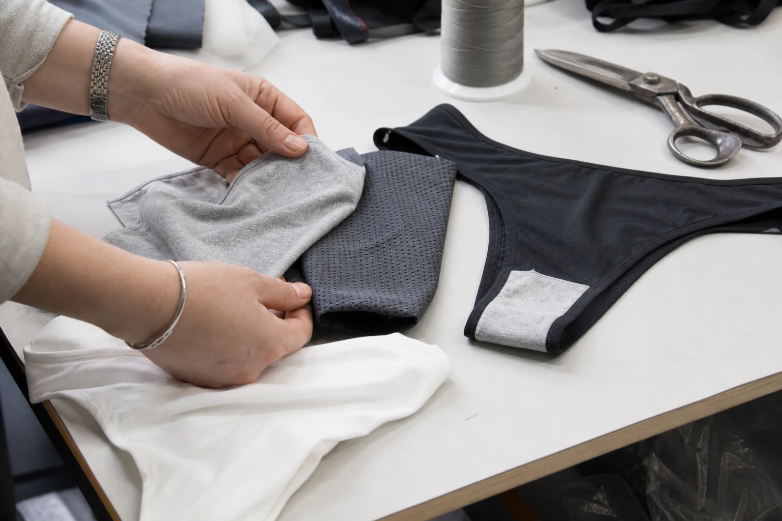 Breathable cotton and microfiber panels prepared for thong production
